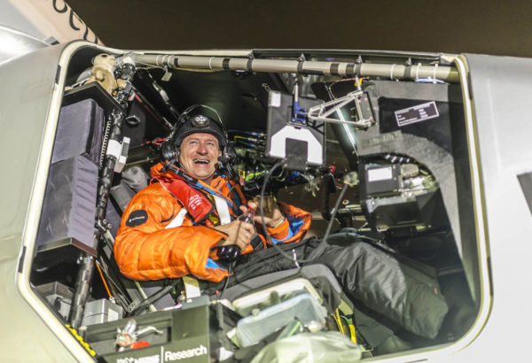 Pilot Andre Boschberg reacts after he landed "Solar Impulse 2" in Muscat March 9, 2015. Two pilots attempting the first flight around the world in a solar-powered plane began the maiden leg of their voyage on Monday, the mission's official website said. "Solar Impulse 2" took off from Abu Dhabi in the United Arab Emirates en route to the Omani capital Muscat at the start of a five-month journey of 35,000 km (22,000 miles) organised to focus the world's attention on sustainable energy. REUTERS/Jean Revillard/Handout via Reuters (OMAN - Tags: TRANSPORT SCIENCE TECHNOLOGY ENVIRONMENT) ATTENTION EDITORS - FOR EDITORIAL USE ONLY. NOT FOR SALE FOR MARKETING OR ADVERTISING CAMPAIGNS. THIS PICTURE WAS PROVIDED BY A THIRD PARTY. REUTERS IS UNABLE TO INDEPENDENTLY VERIFY THE AUTHENTICITY, CONTENT, LOCATION OR DATE OF THIS IMAGE. THIS PICTURE IS DISTRIBUTED EXACTLY AS RECEIVED BY REUTERS, AS A SERVICE TO CLIENTS - RTR4SOB0
