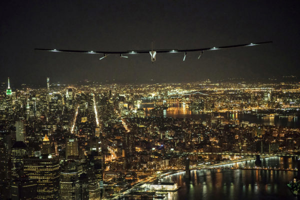 Solar Impulse 2, the solar airplane, piloted by Swiss adventurer Andre Borschberg, flies over Manhattan, U.S. on June 11, 2016 shortly before landing at John F. Kennedy airport. Leg 14 was the shortest so far on the planes trip around the globe. Andre Borschberg, Jean Revillard/SI2/Handout via Reuters/File Photo ATTENTION EDITORS - THIS IMAGE WAS PROVIDED BY A THIRD PARTY. FOR EDITORIAL USE ONLY. - RTSJNRF