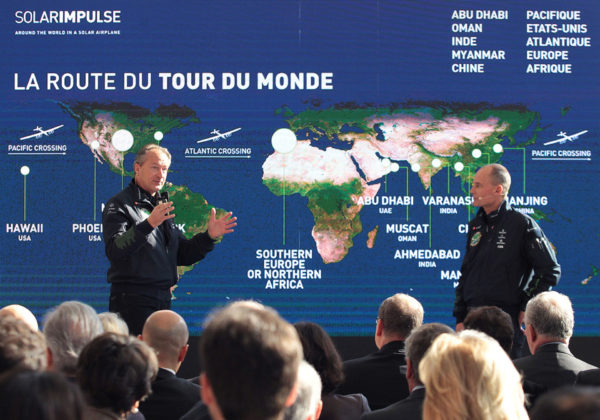 Switzerland's Andr? Borschberg (L) and Bertrand Piccard (R), Solar Impulse founders and pilots, present the new Monaco Solar Impulse control center, on February, 10, 2015, in Monaco. The privately-financed project Solar Impulse hopes to achieve the first circumnavigation of the Earth by a piloted fixed-wing aircraft using only solar power. This circumnavigation is scheduled to begin in March 2015 in Abu Dhabi in the United Arab Emirates and to return there five months later. AFP PHOTO / JEAN CHRISTOPHE MAGNENET (Photo credit should read JEAN CHRISTOPHE MAGNENET/AFP/Getty Images)